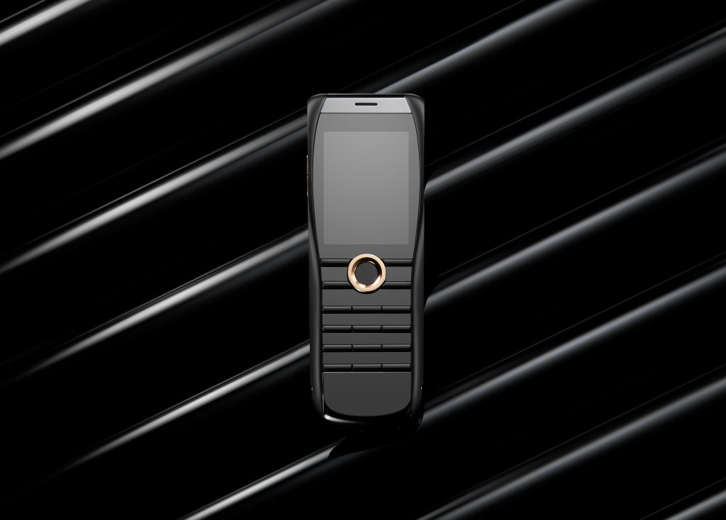 Unique phone in matte black with gold detailing, a symbol of British craftsmanship and discreet elegance.